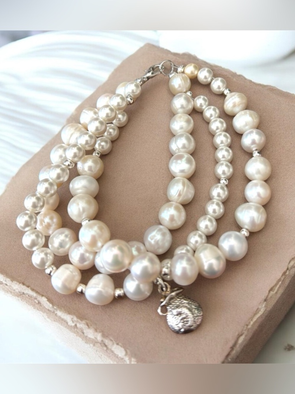 Lustrous Fresh Water Pearl Multi-Strand Bracelet with Silver Charm
